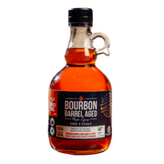 Bottle of Bourbon Barrel Aged syrup on a white background
